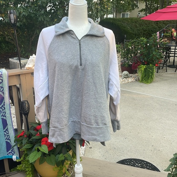 Nike Sweatshirt. White and tan sleeves with a grey mid torso section. - Picture 5 of 7